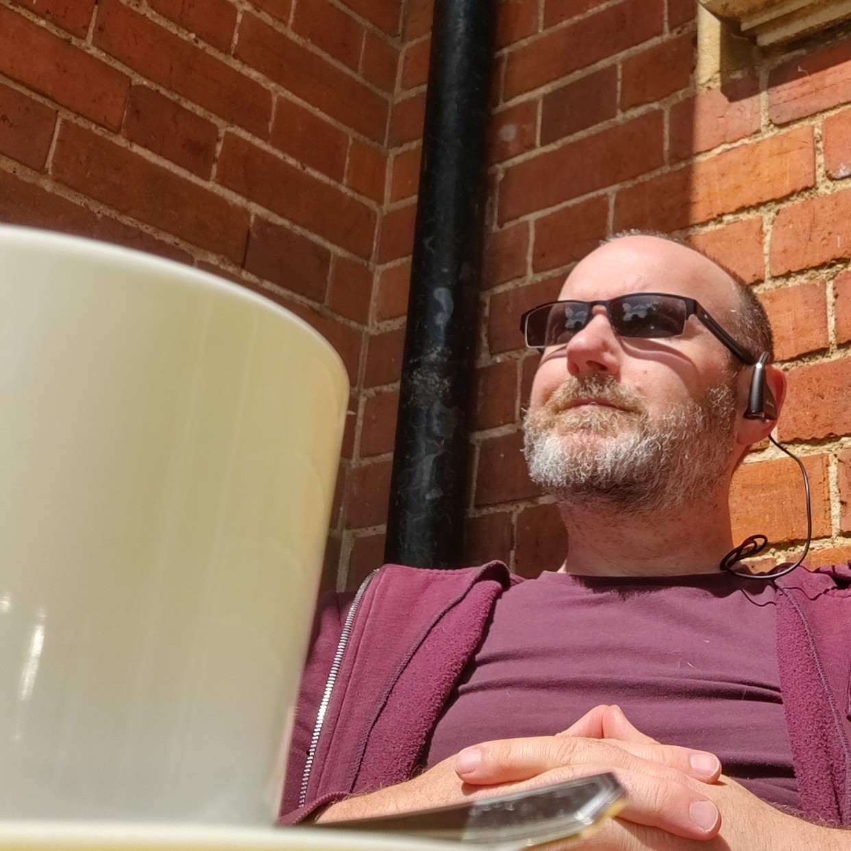 50daysofshades d13-i02 Just chillin - Stephen Wells Sensational Business Coach in hat and shade with coffee